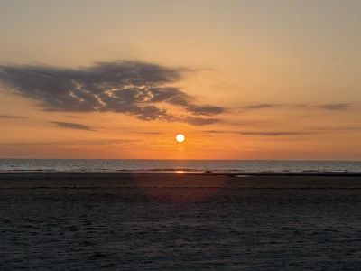 Sonnenuntergang Wasser auf dem Bild Bormose Strand